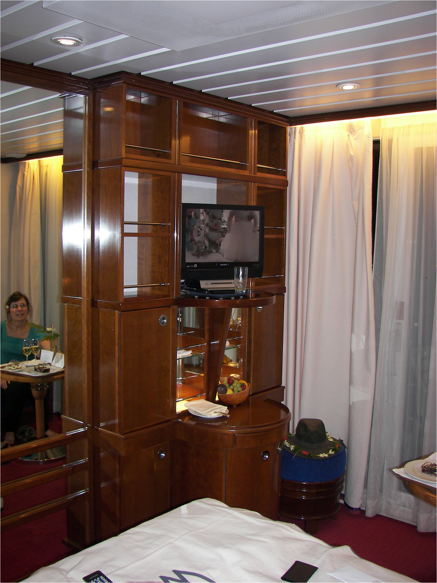 Stateroom looking towards the starboard side of the ship.  Stateroom came with small balcony on the other side of the curtains