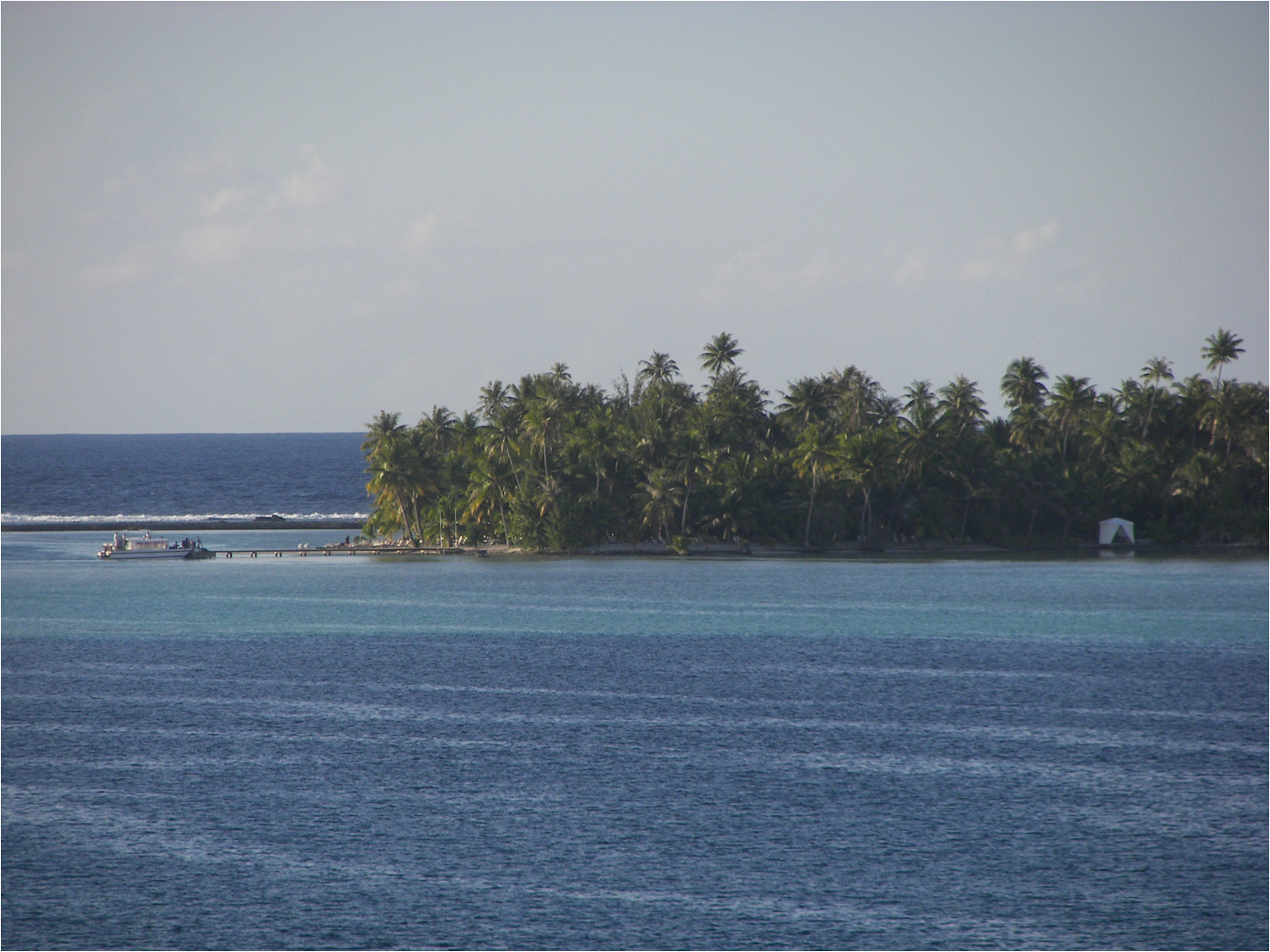 Private motu (small island) of Regent Seven Seas Cruise Lines, in the Tahaa lagoon.  We spent part of the day there enjoying a barbecue lunch before snorkeling.