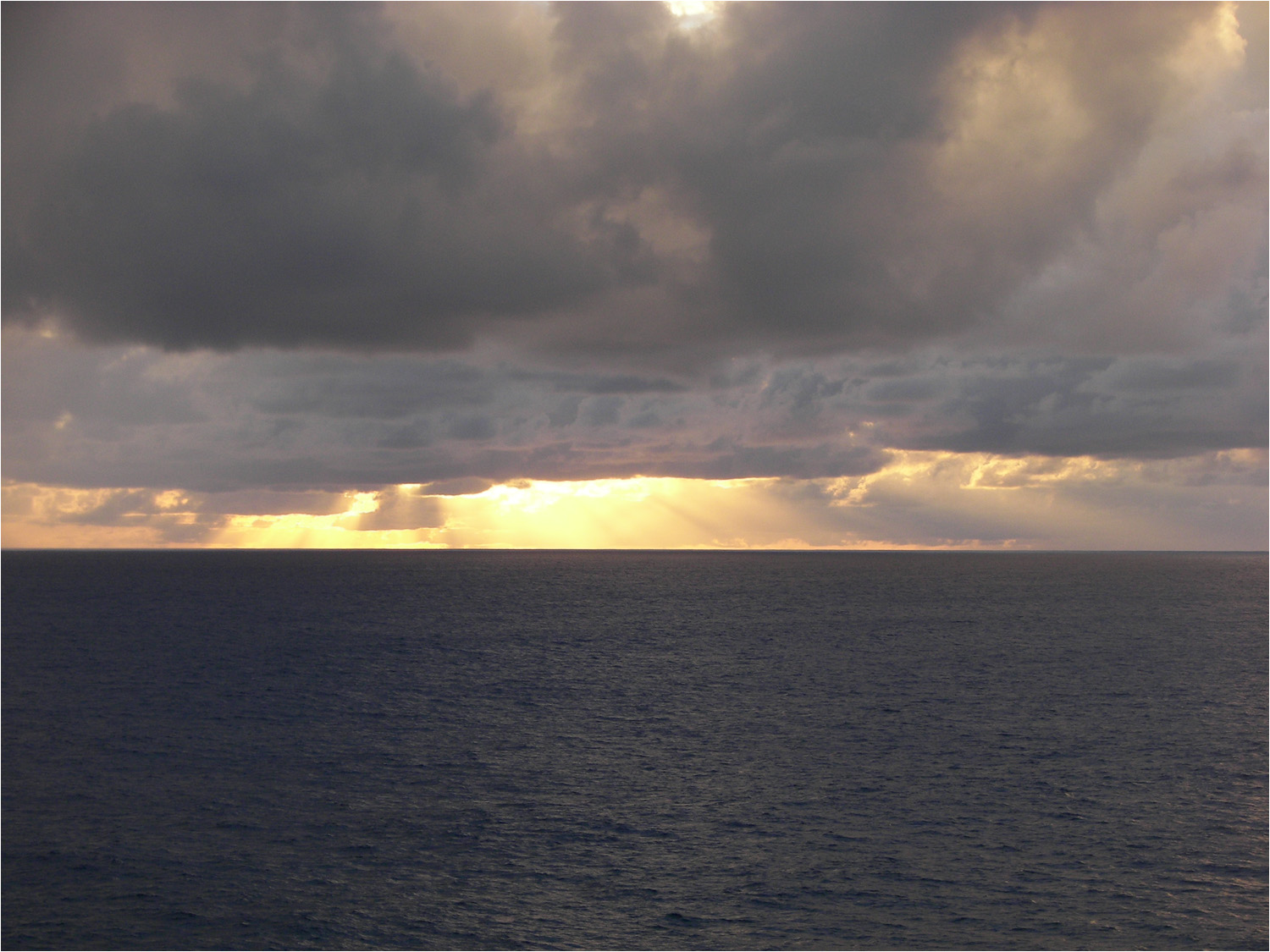 Friday morning sunrise on our way to Huahine about 7AM