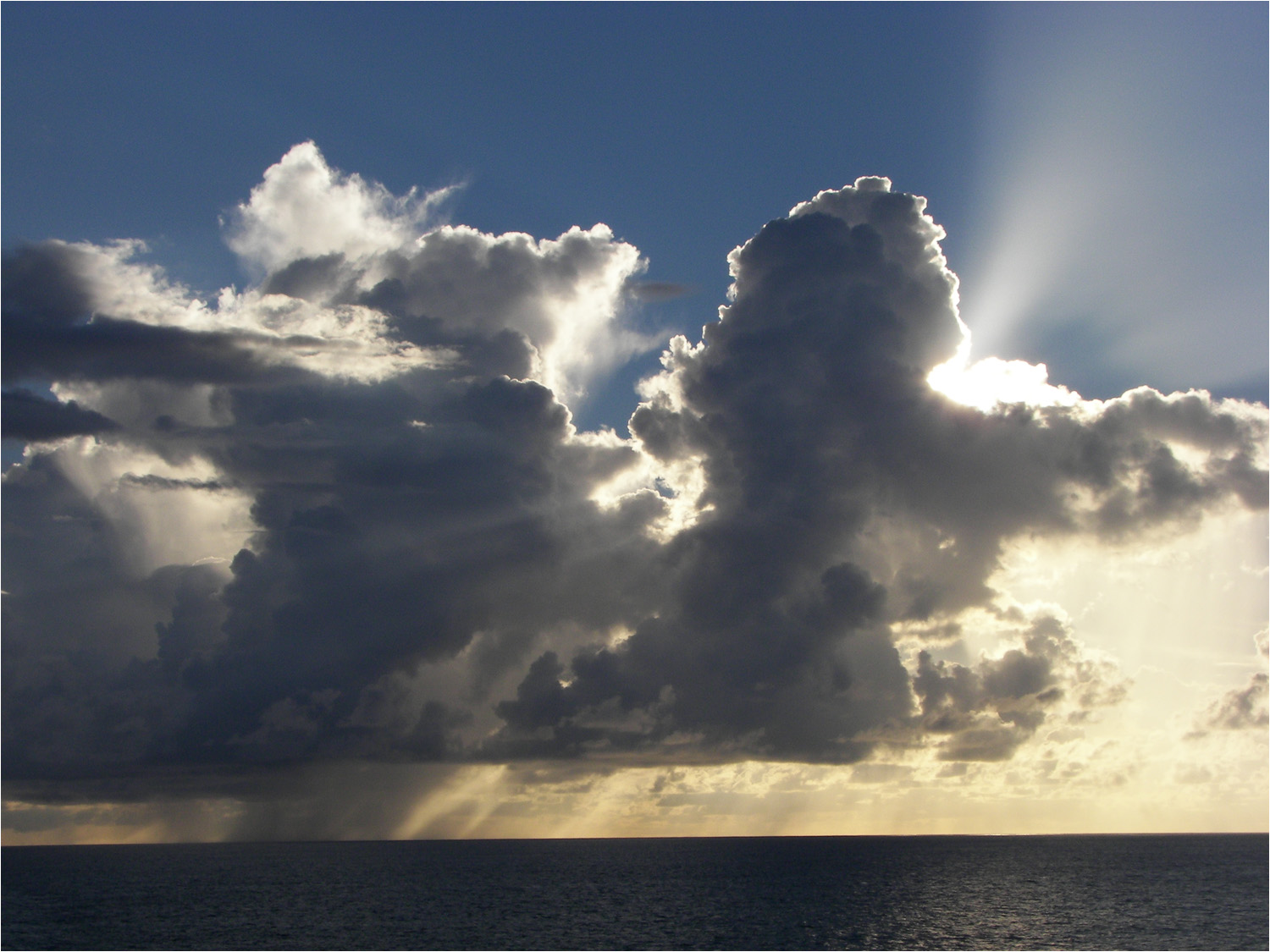 Friday morning sunrise on our way to Huahine about 7AM