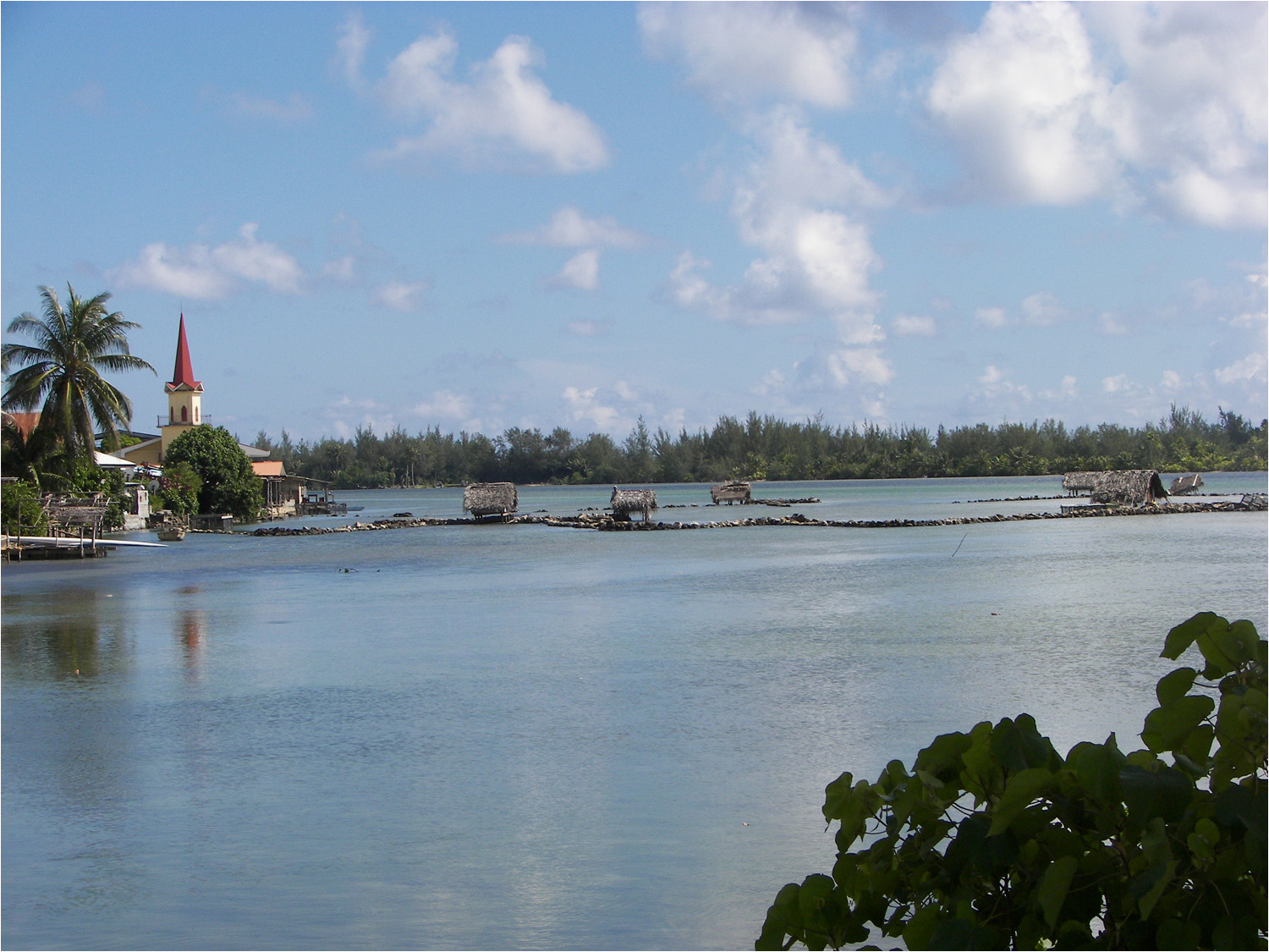 A series of fish traps set up near the bridge which connects the two islands of Huahine.  As much as 400 fish are caught in a single day in these traps.