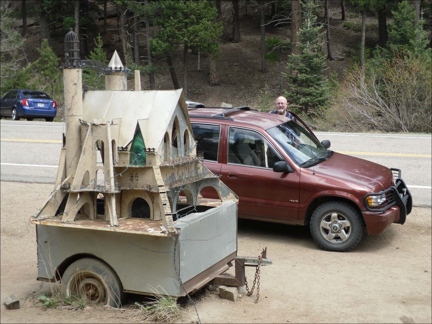 Bishop's Castle in Colorado-Dad w/miniature castle