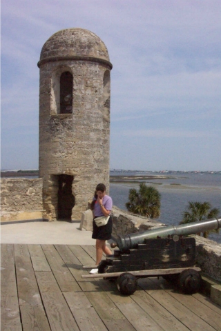 Inspecting one of several canons of the Castillo de San Marcos