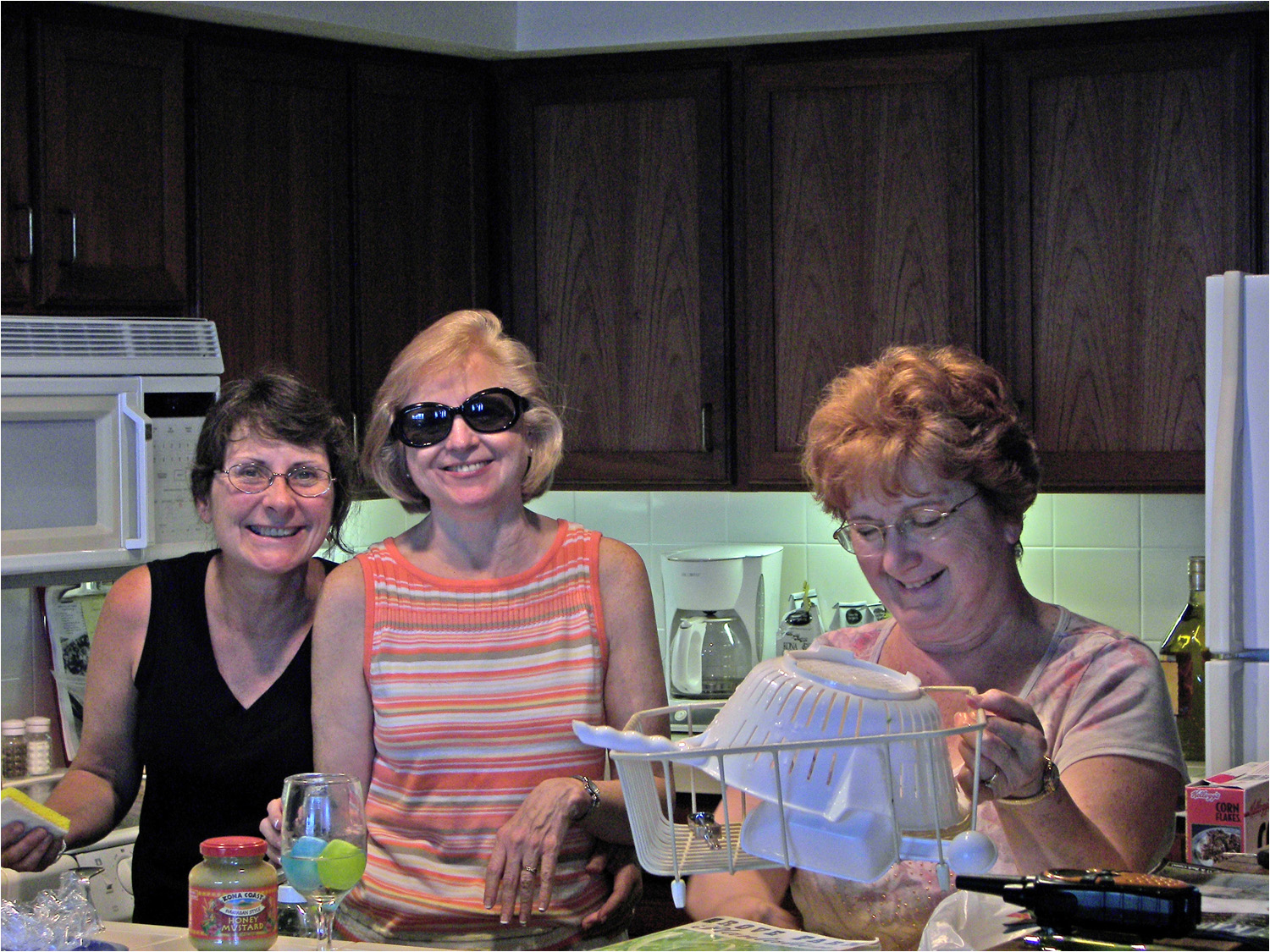 L-R, Kath, Jenny and Minda in the kitchen of unit#6.