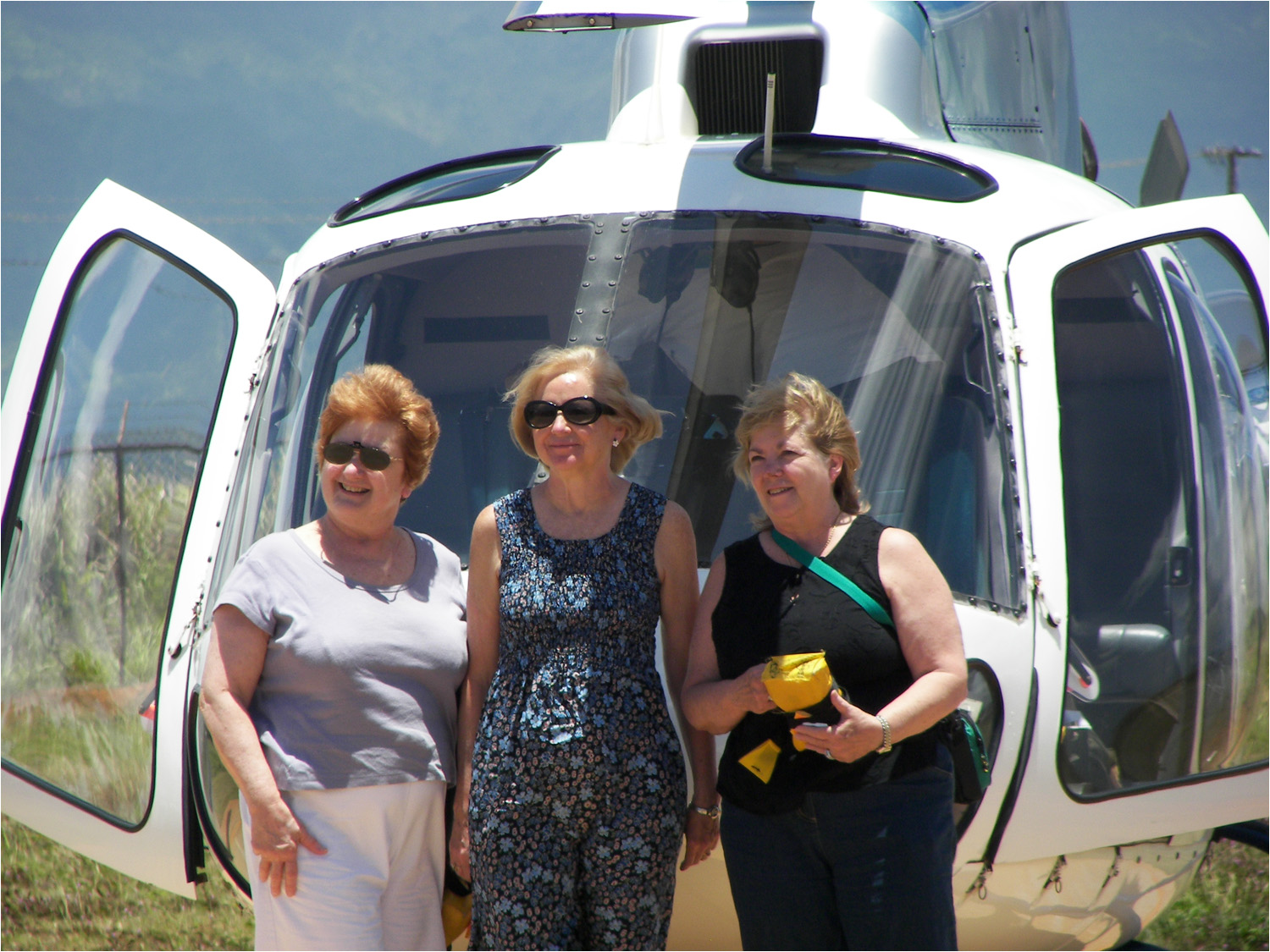 Posing before helicopter tour of Kauai.  L-R, Minda, Ginny, and Ann.