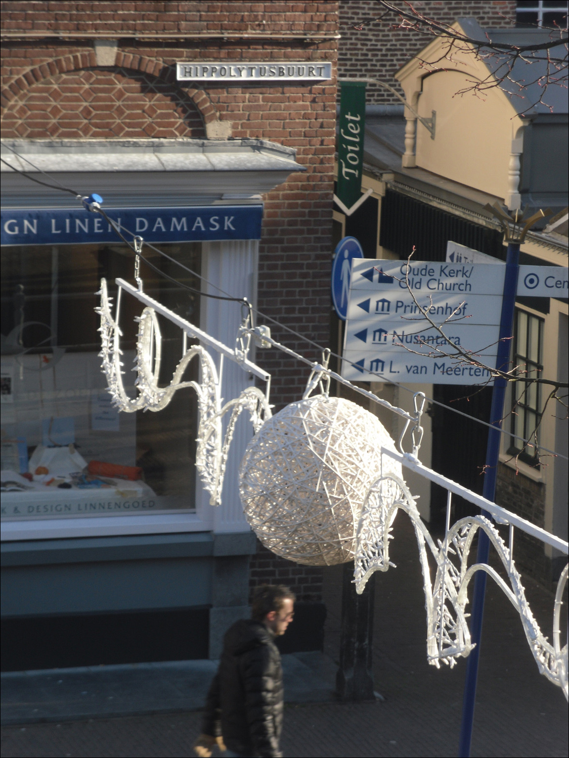 One of many Christmas lights hung across canal along Hippolytusbuurt St