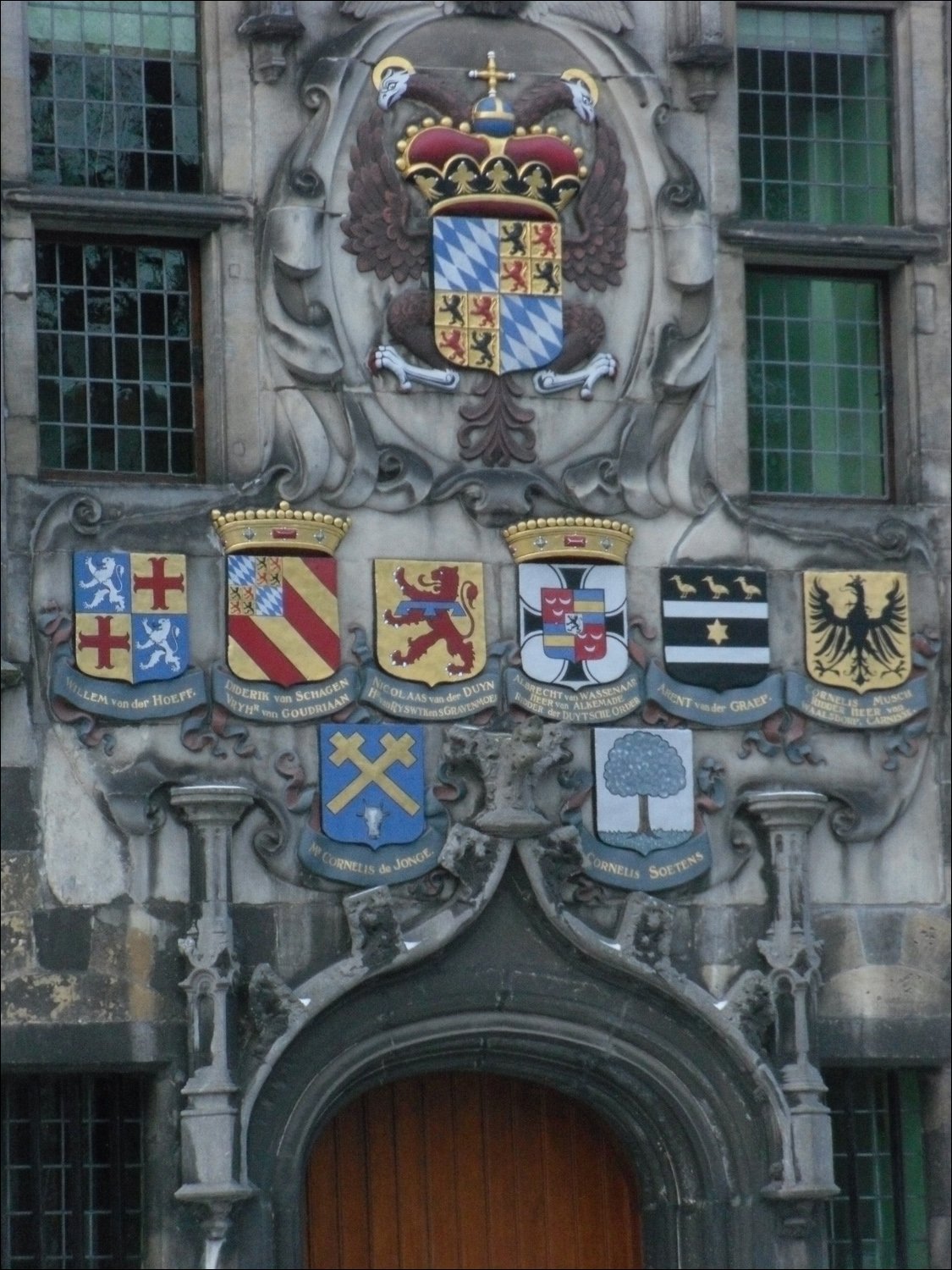 Crests over door on waterworks building in Delft