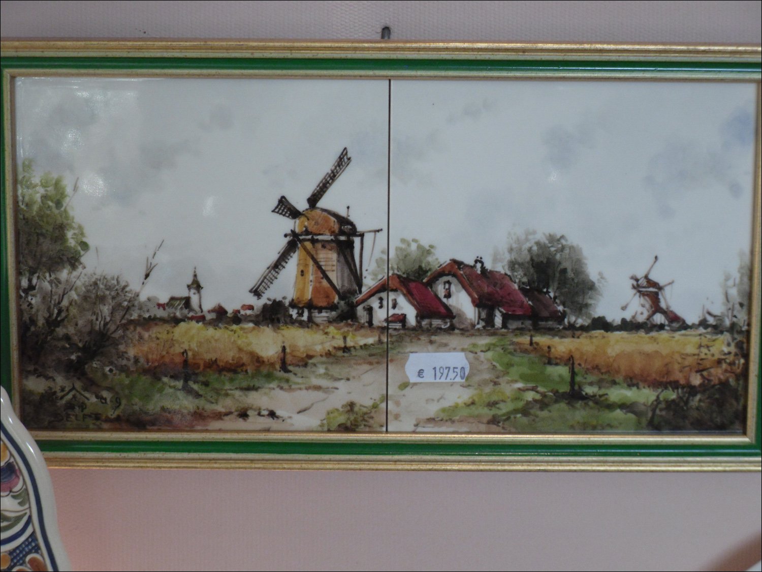 Delfts Pauw - yes, those are euros for the tile