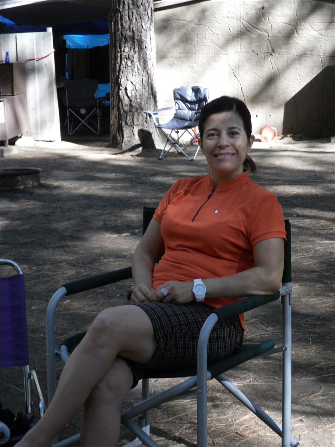 Sherry Orosco resting outside Housekeeping unit.