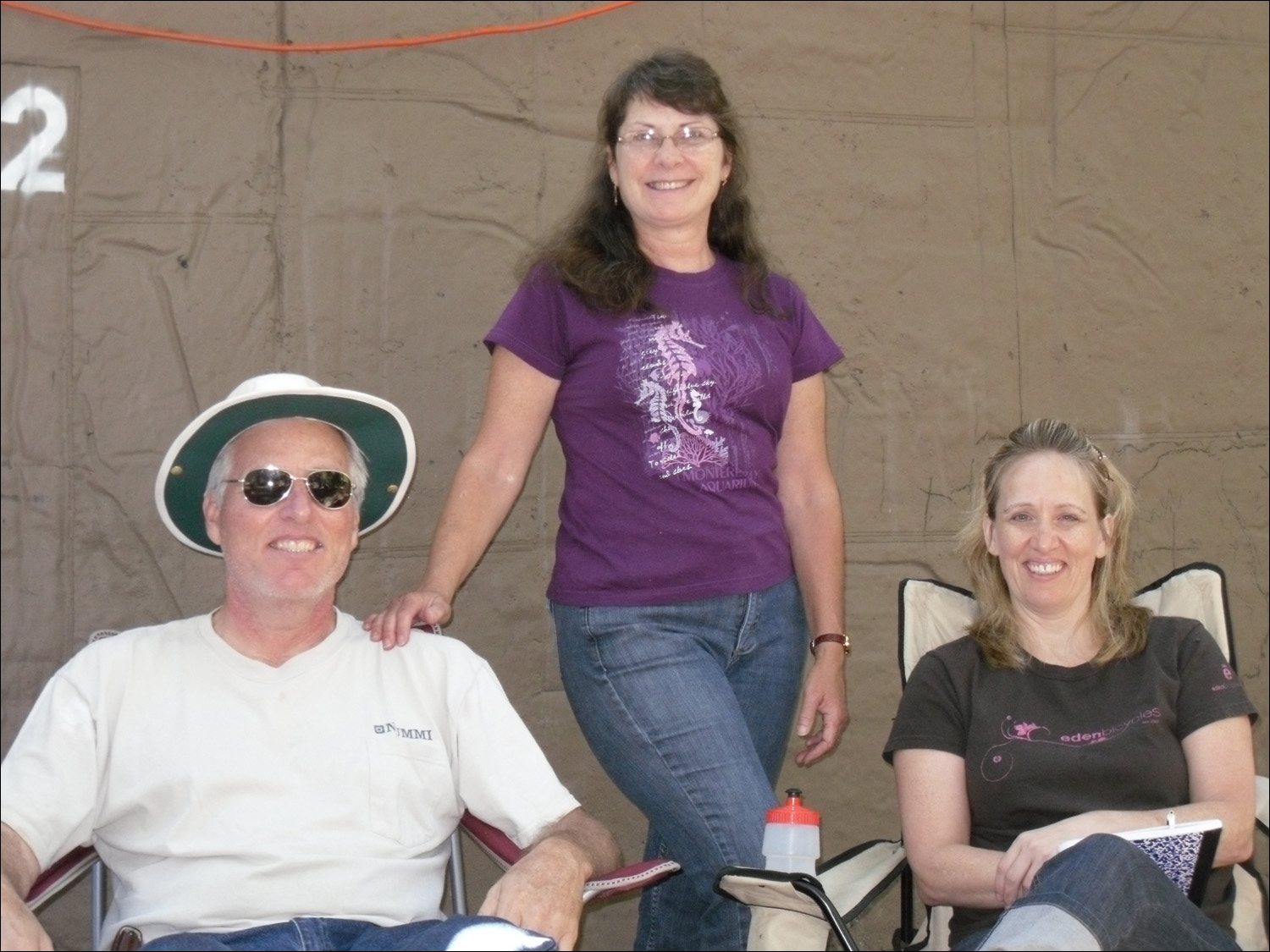 Bob, Katherine, & Sondra resting outside Housekeeping unit.